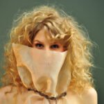 Fashion Show event photography of woman hiding behind costume in Montreal Canada