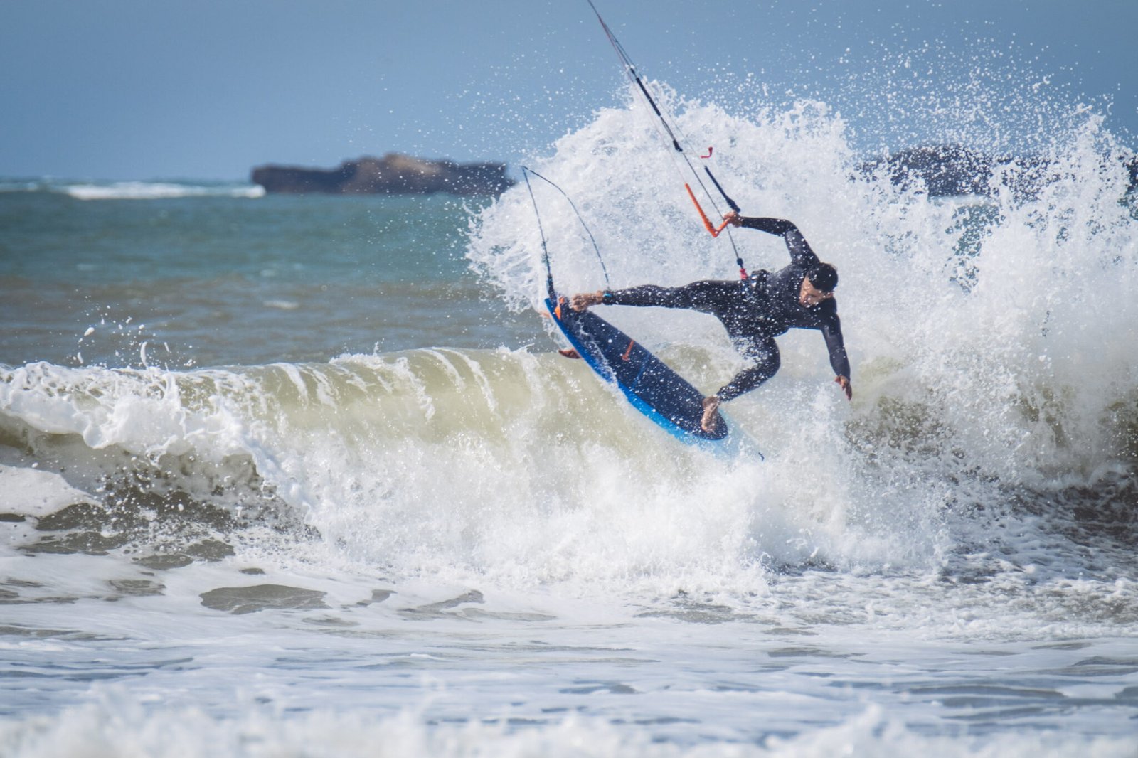 professional kitesurfer catching a wave in Essaouira Morocco by Susan Paige photography