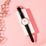 Watch studio product photography on vibrant peach background by Susan Paige Photography for Marketing SSG in Essaouira Morocco