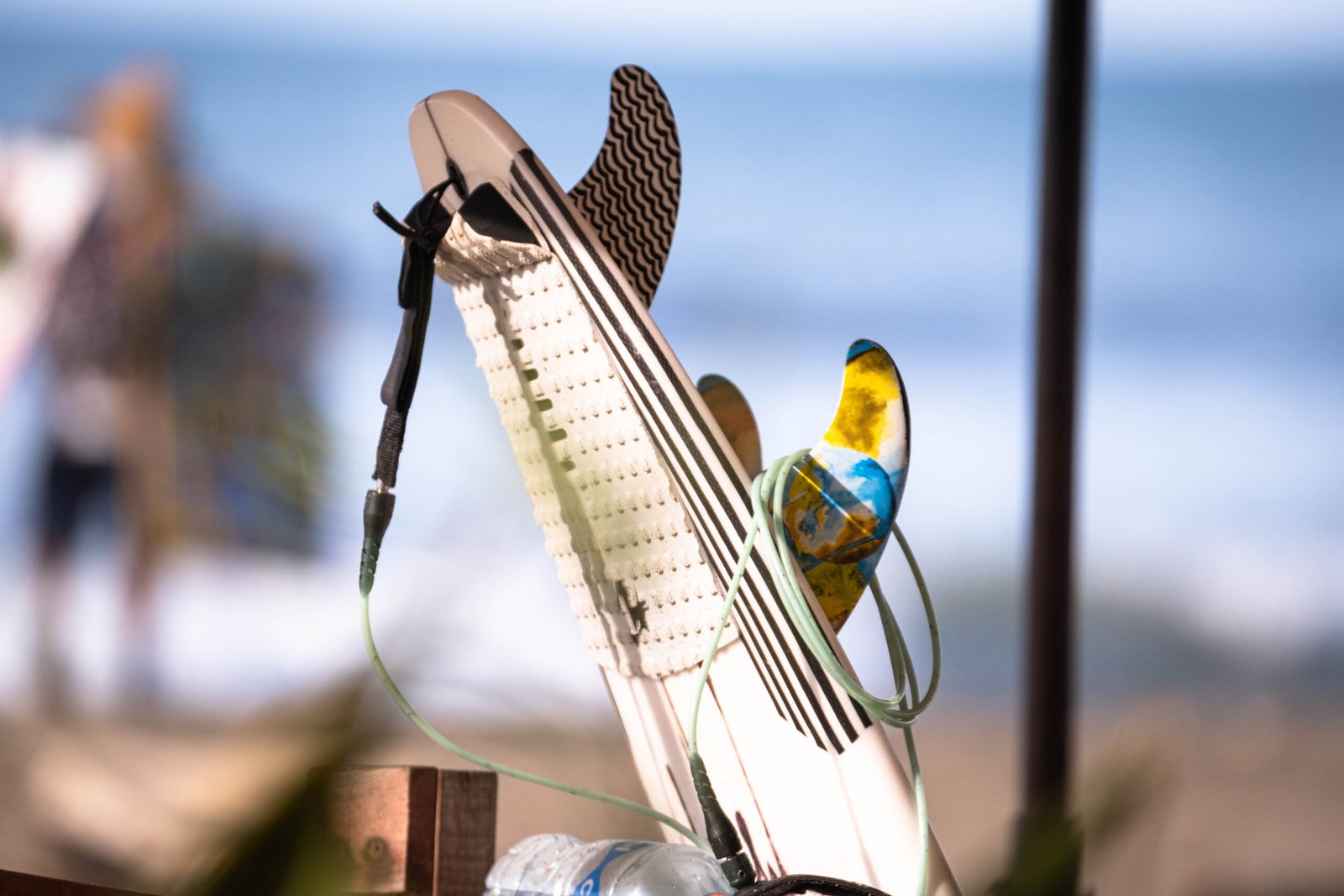 Surfboard in the shade on the beach in Mexico.