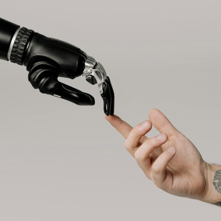 AI robot hand touching a human hand