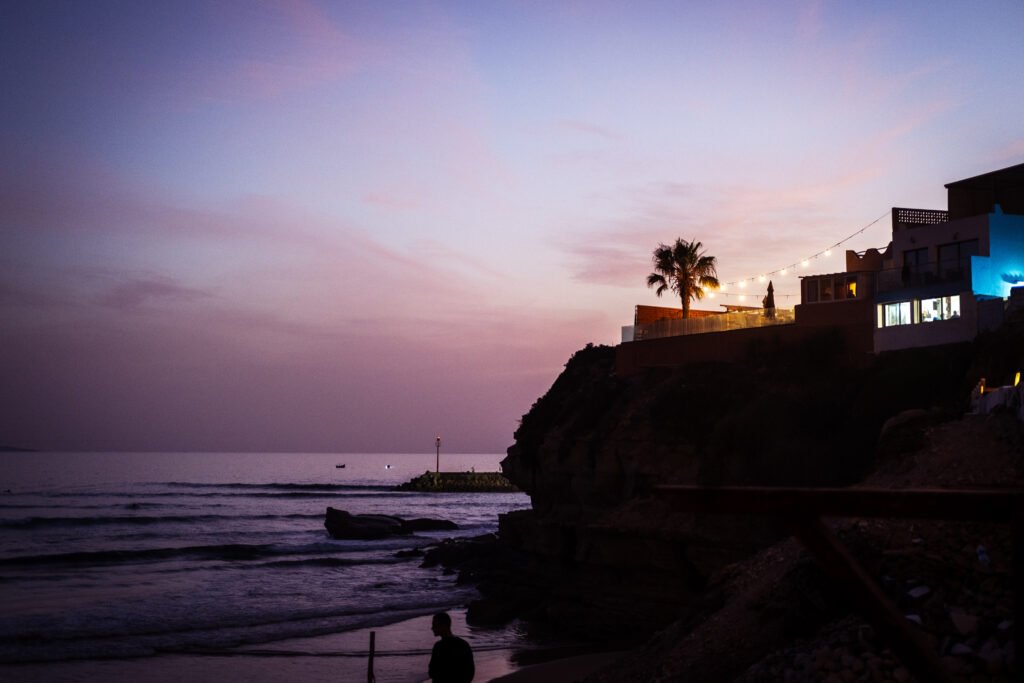 Dusk with palm tree of Imsouane Morocco with fujifilm photography by Susan Paige